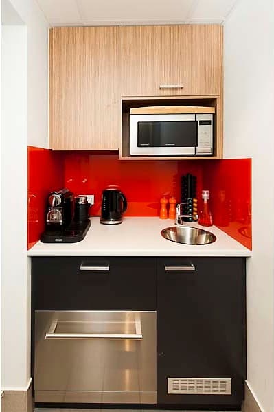 Kitchenette and red splashback